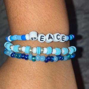 Three bracelets. Inspired by the oceans colors.one bracelet with peace word